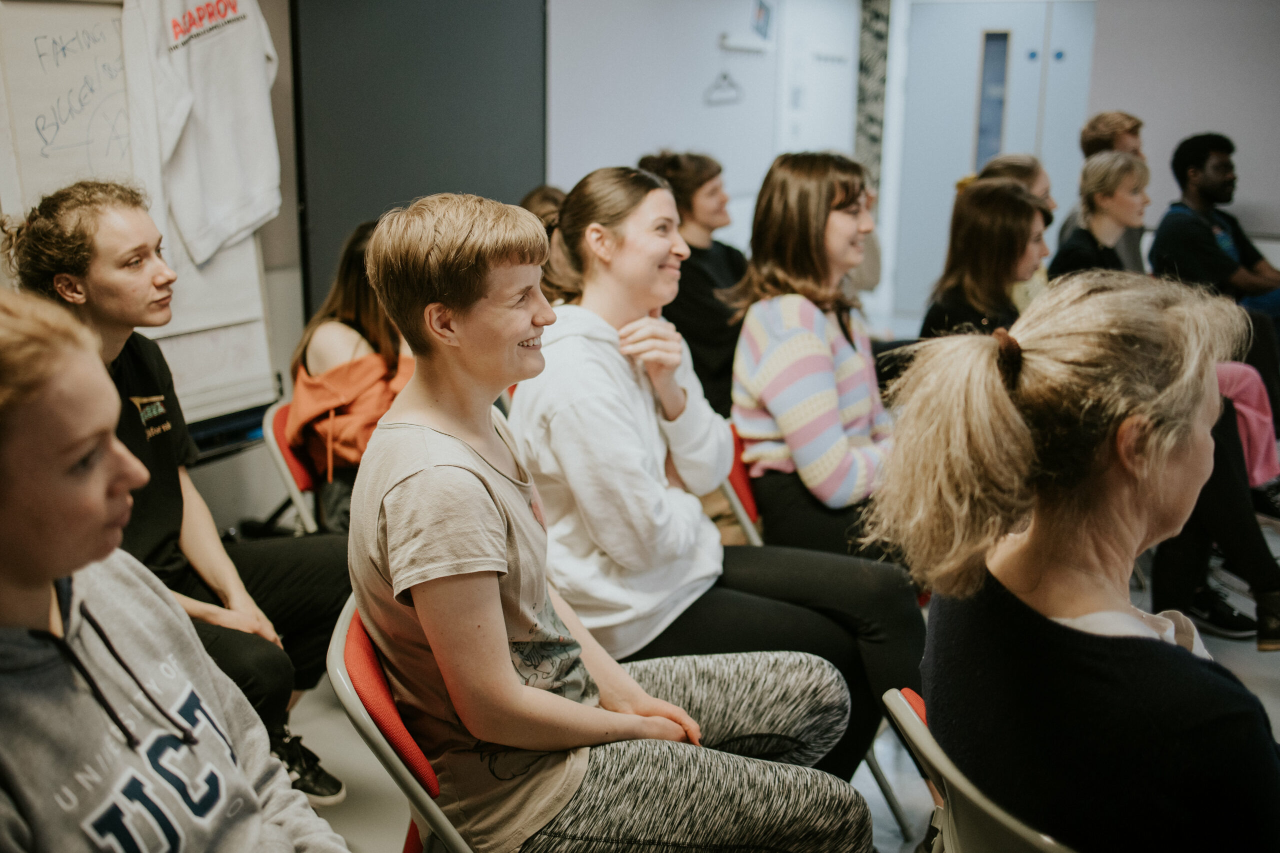 A group of participants listening at a Spotlight Open House workshop