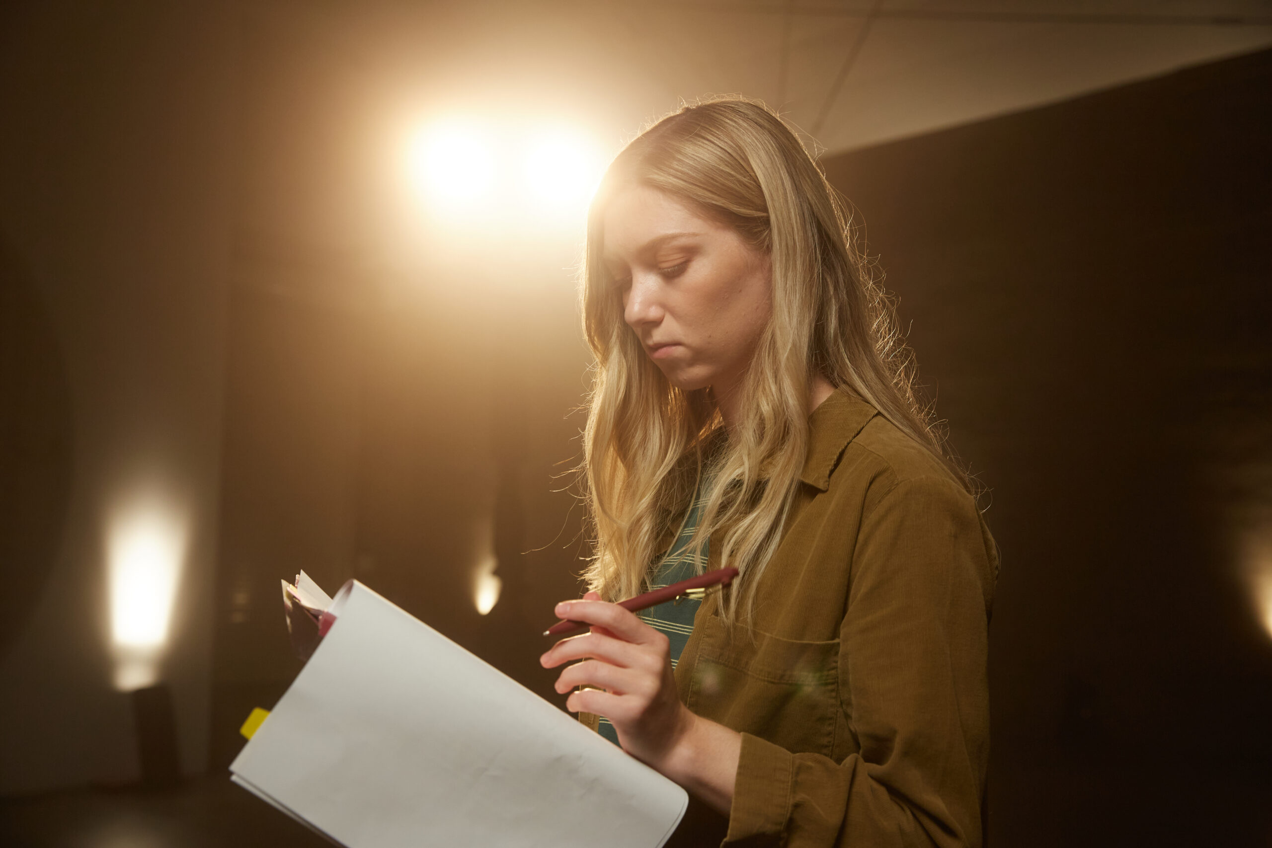 Actress looking at script preparing for an audition